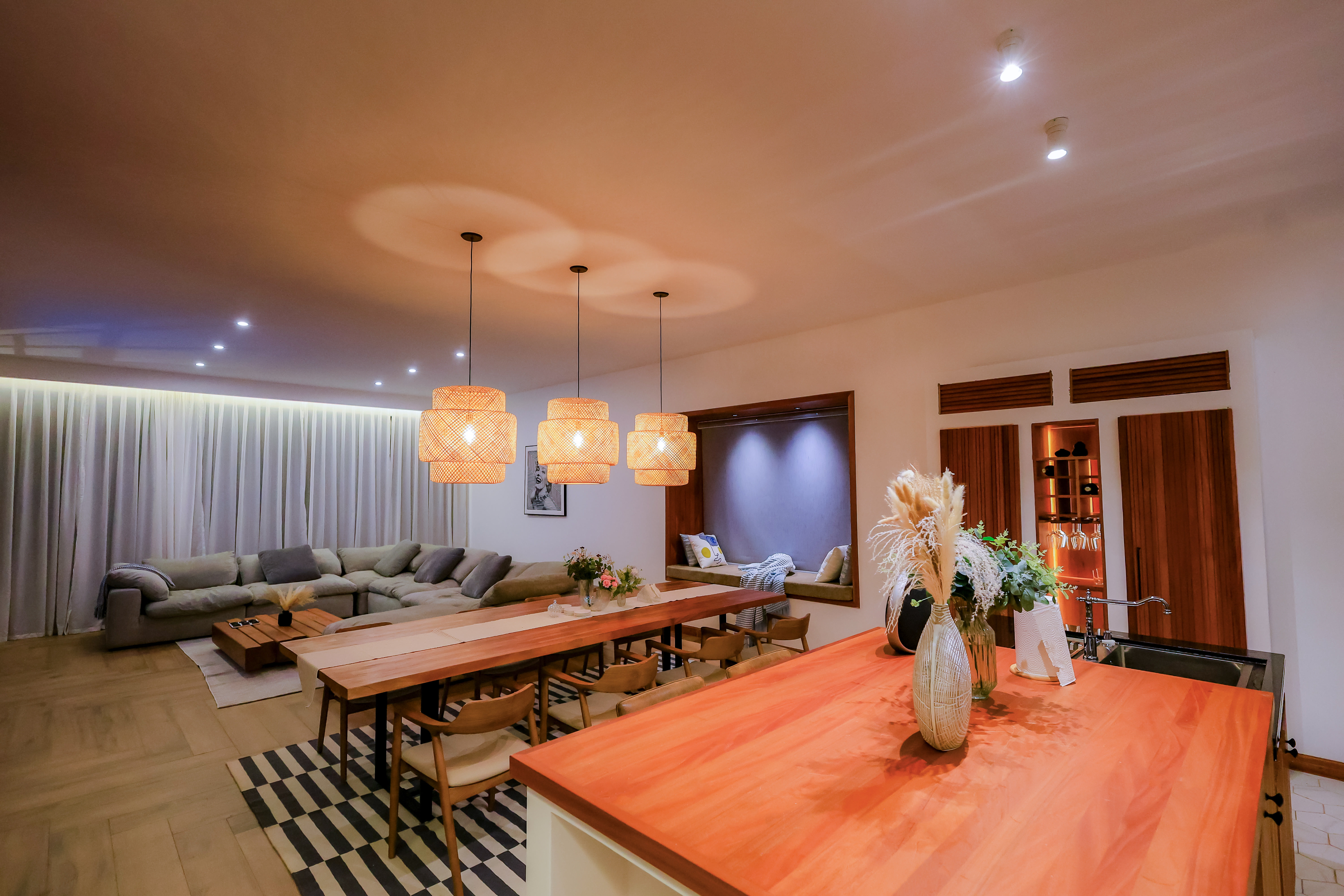 Panoramic view of Kokasemera Country Villa outdoor living space with Rwenzori mountains in the background