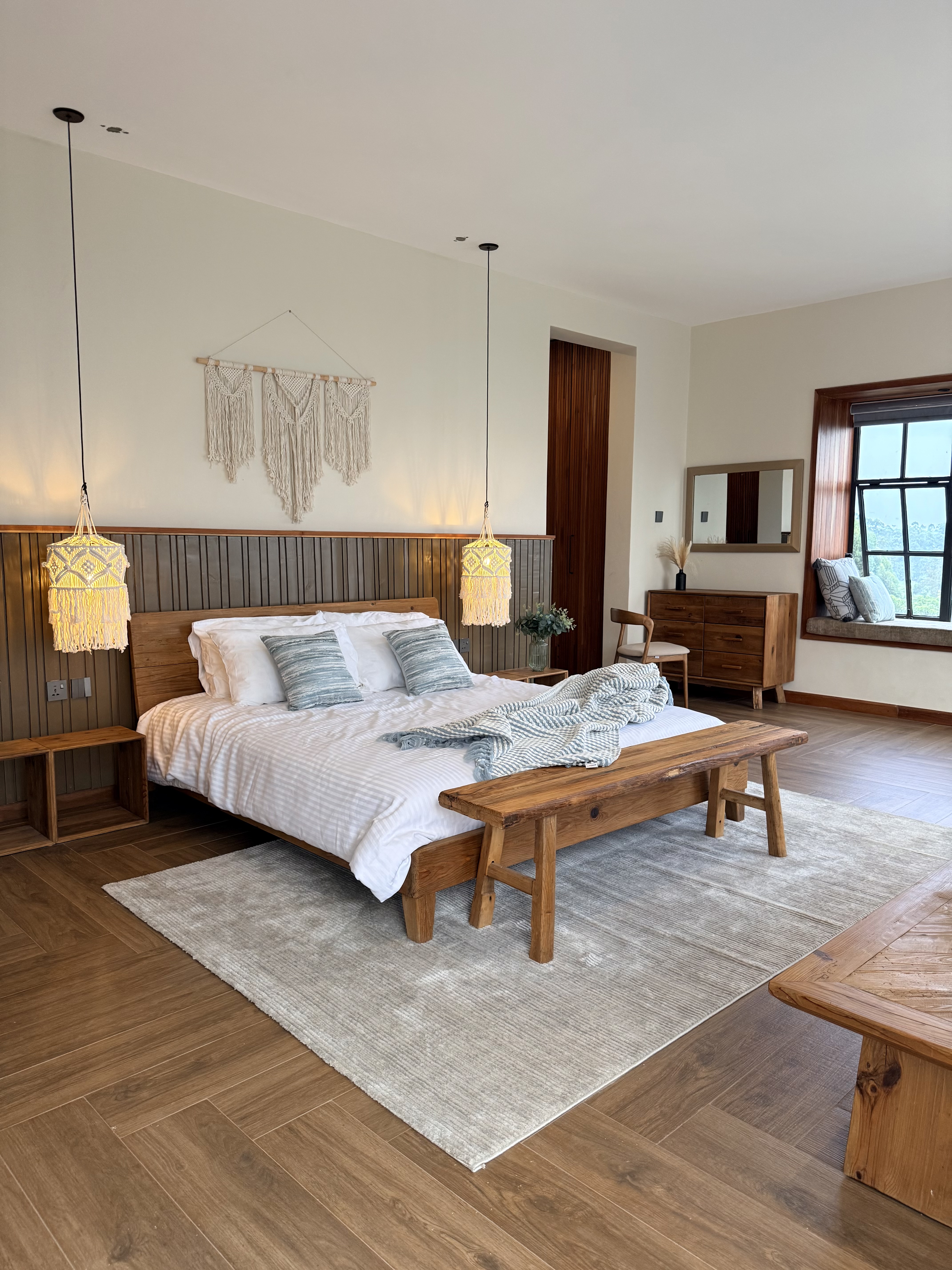 Deluxe bedroom interior with king size bed and modern decor